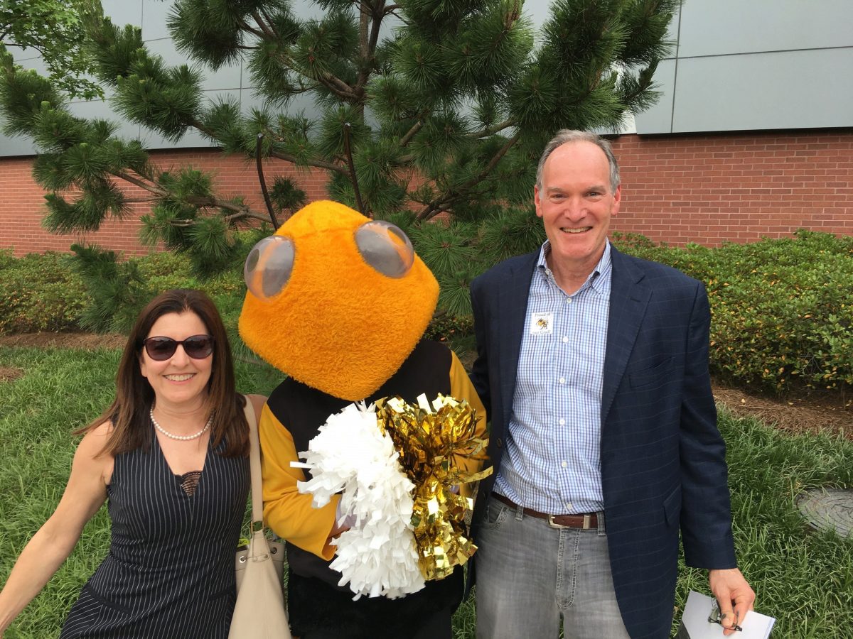 Carlos Barroso and his wife, Kay Colbert, with Buzz.