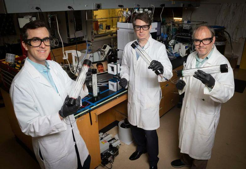 Researchers in lab studying carbon capture technology